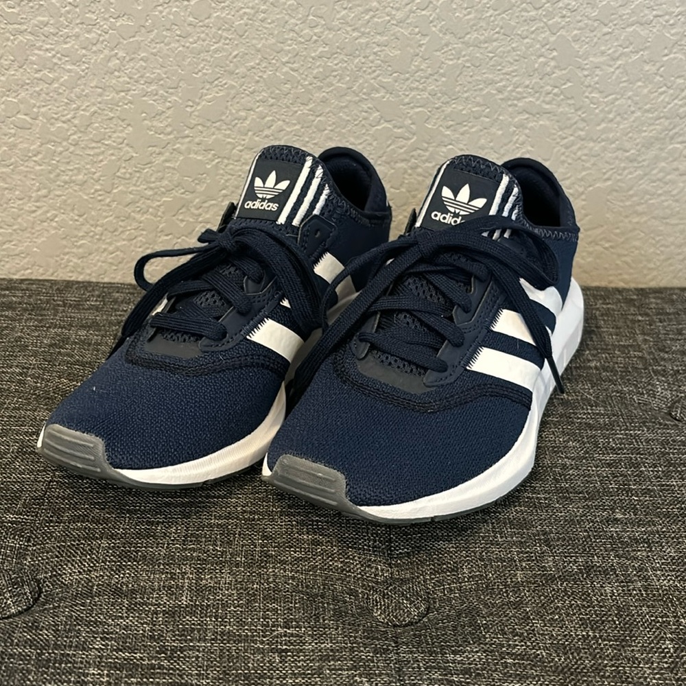 Adidas. 6. Like new. Navy and white. make and offer